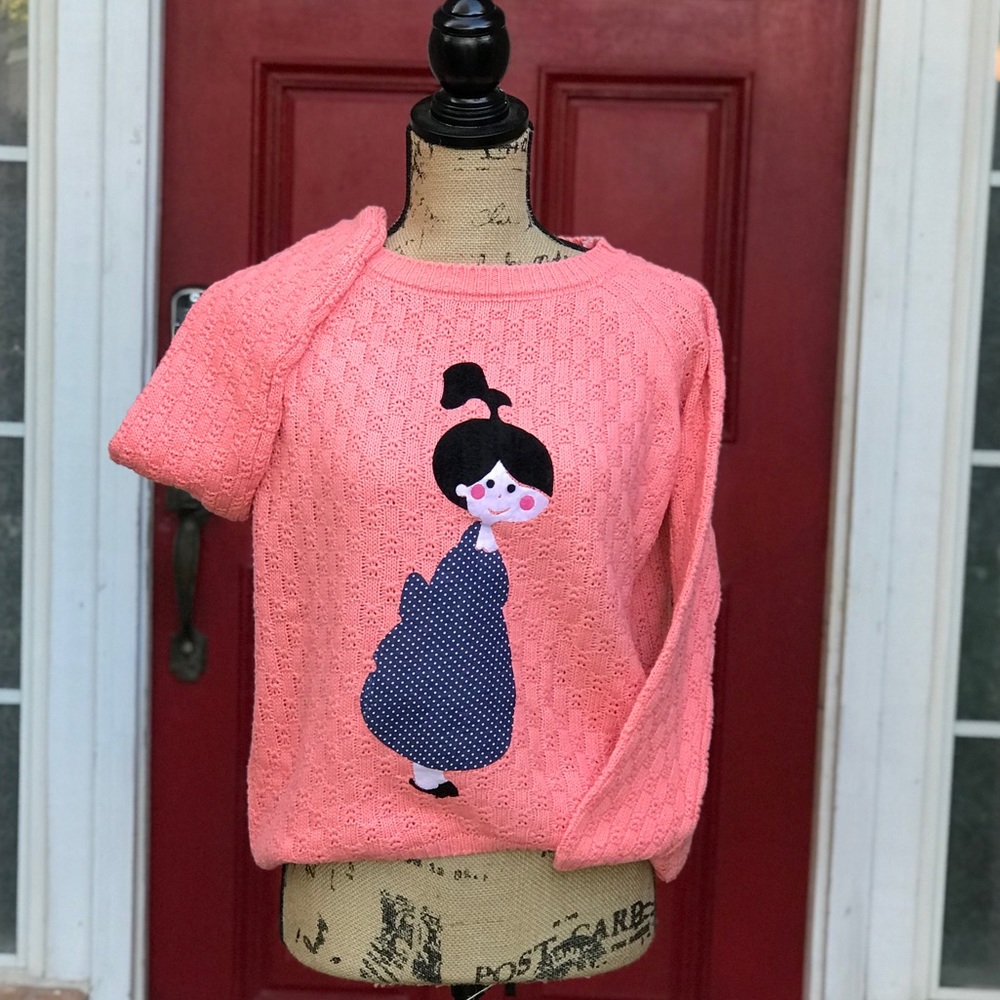 Peachy Colored Sweater, little girl with rosie cheeks.